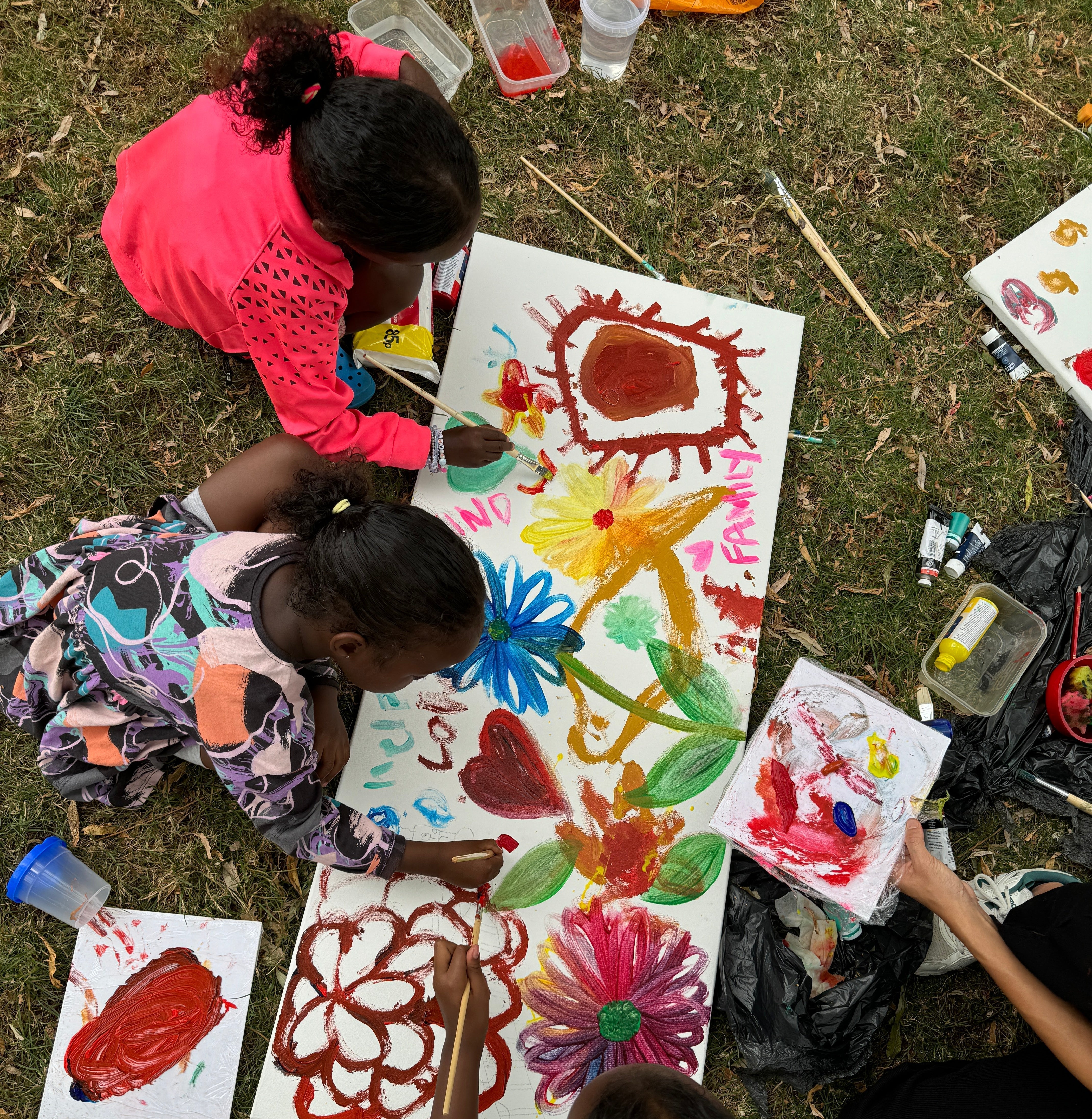 Painting with the kids at Home-start annual family picnic at Parliament Hill